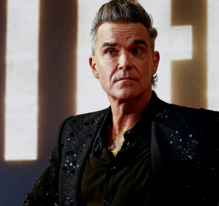 Entre luces y sombras: el viaje emocional de Robbie Williams en "Better Man" 